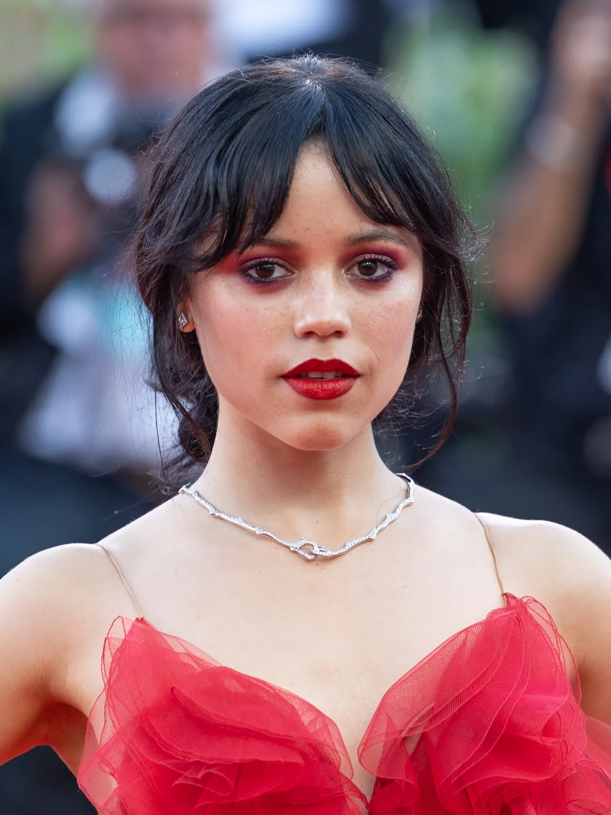 Jenna Ortega photographed on a press red carpet