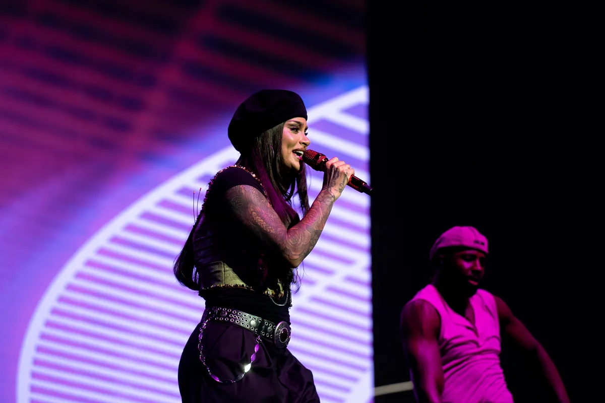 Kehlani performing on stage at the 2026 ESSENCE Festival